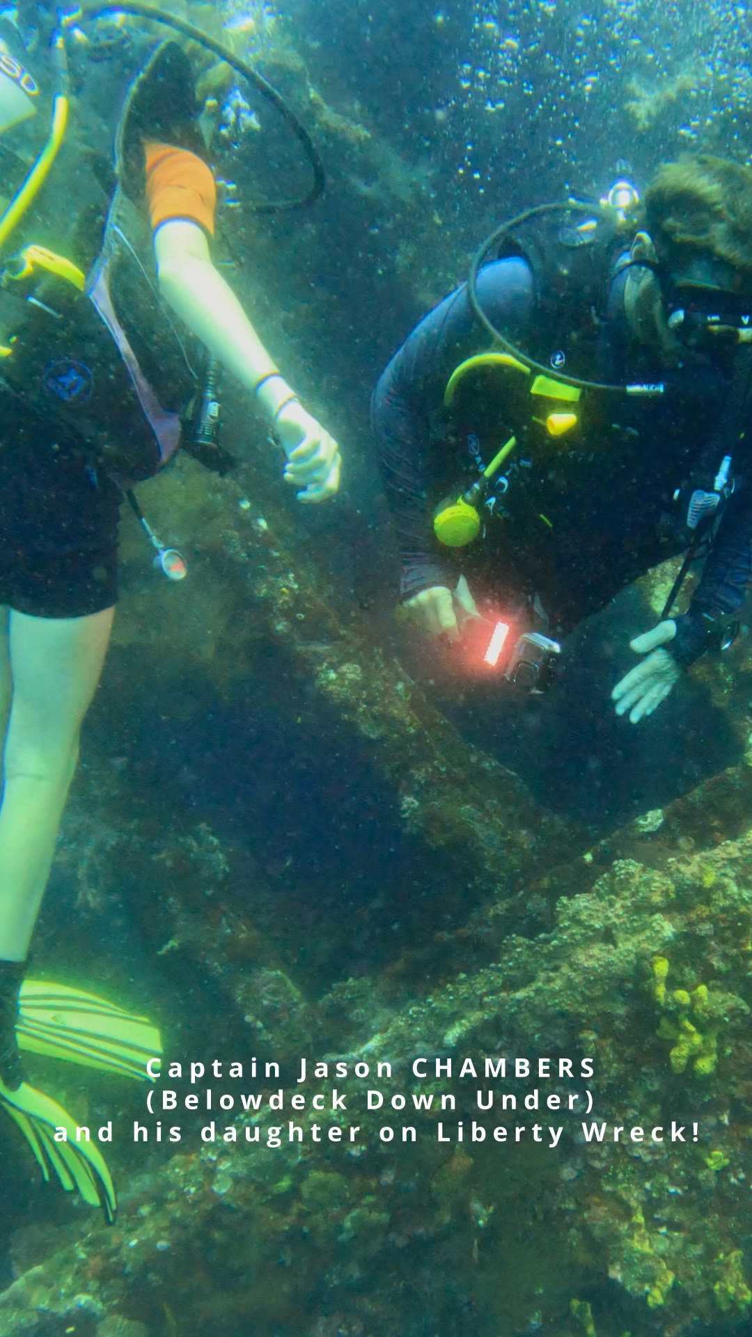 Captain Jason Chambers diving with his daughter on Liberty Wreck Tulamben
